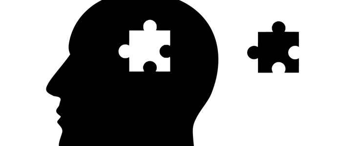 Silhouet of a head with a missing puzzle piece