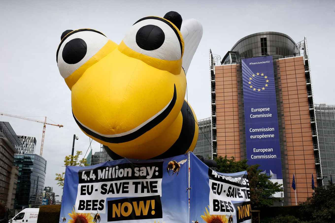 A giant inflated model of a bee during a demonstration in front of the EU Commission offices calling the EU to adopt a ban on bee-killing neonicotinoid pesticides