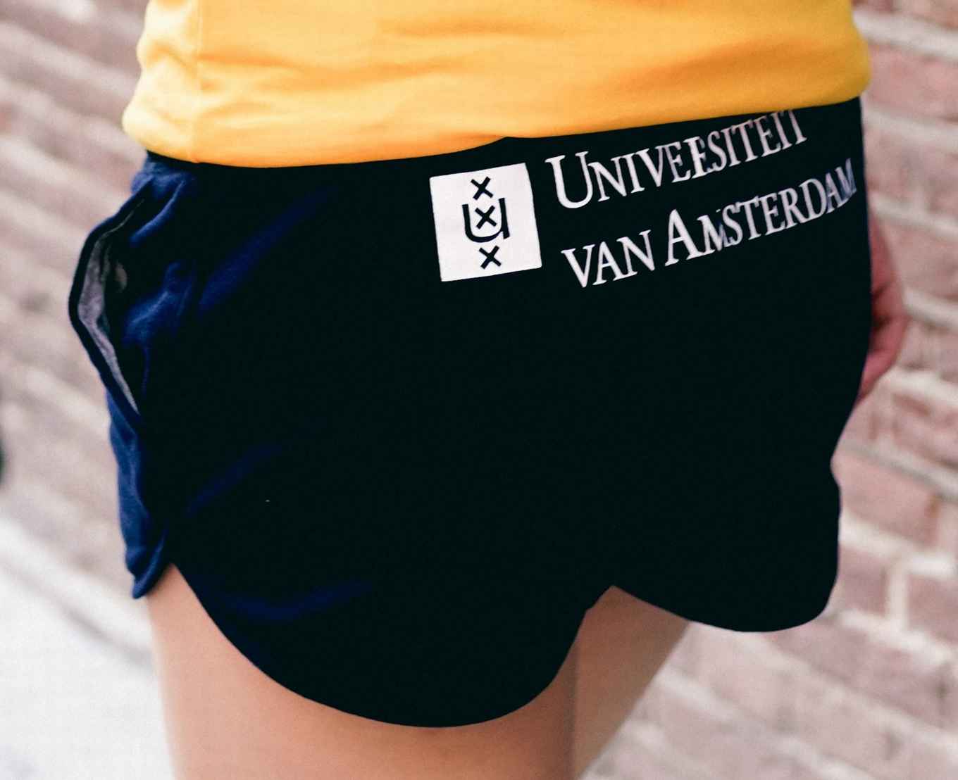 Short dames blauw logo achterkant