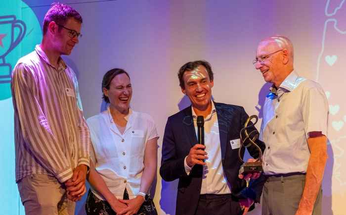 Rob de Lind van Wijngaarden (2e van rechts)
