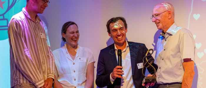 Rob de Lind van Wijngaarden (2e van rechts)